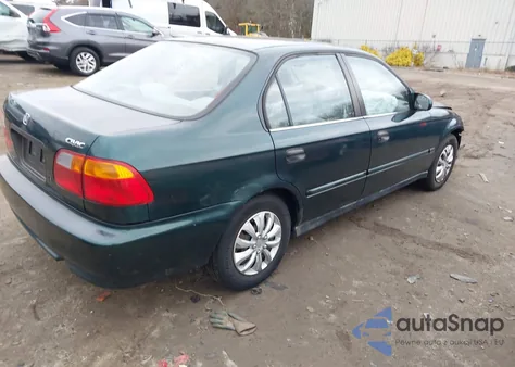 1999 Honda Civic Dx z USA, uszkodzony, nr VIN 2HGEJ6627XH502641